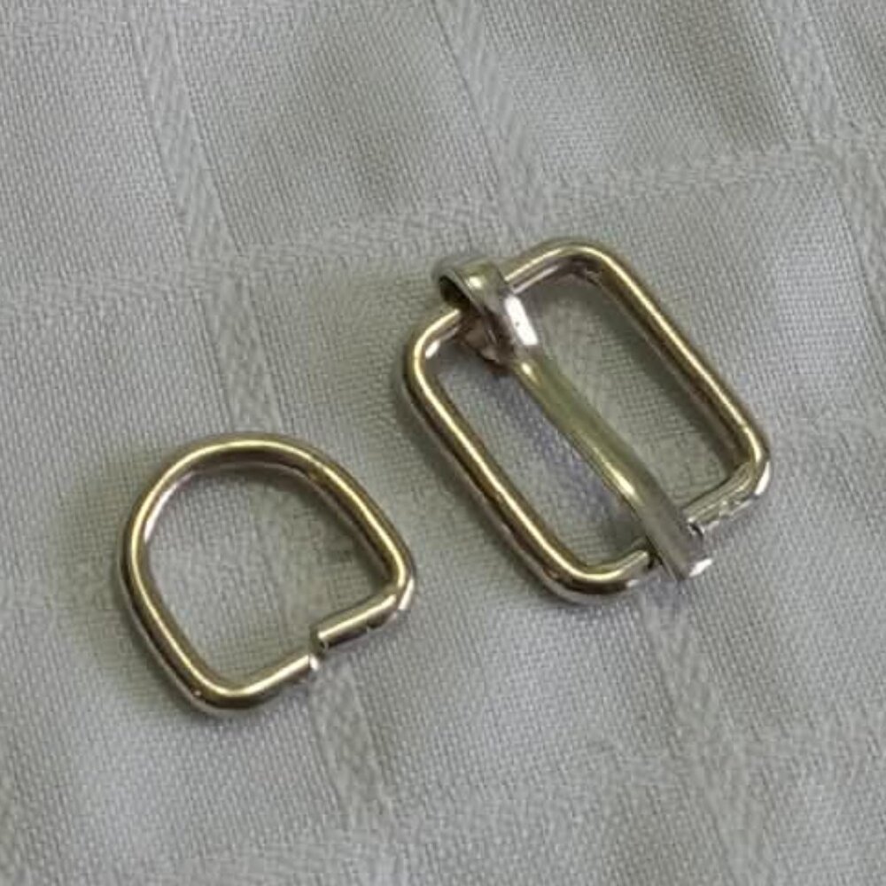 D- Vintage silver-colored handbag buckle